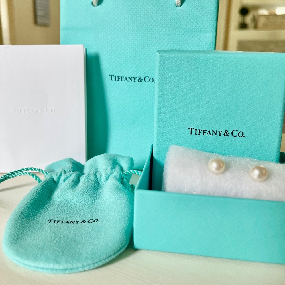 Authentic Tiffany & Co. silver pearl earrings New without tags.